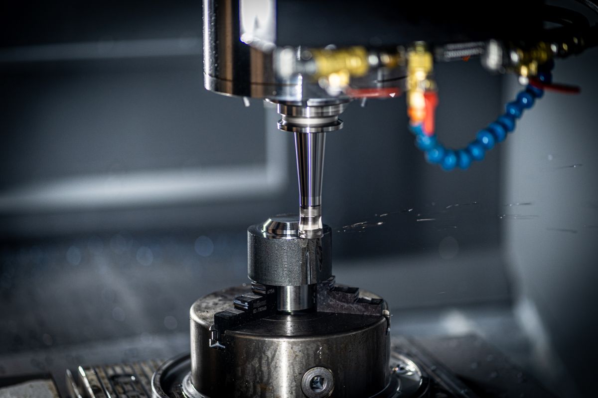 CNC machining center cutting a part